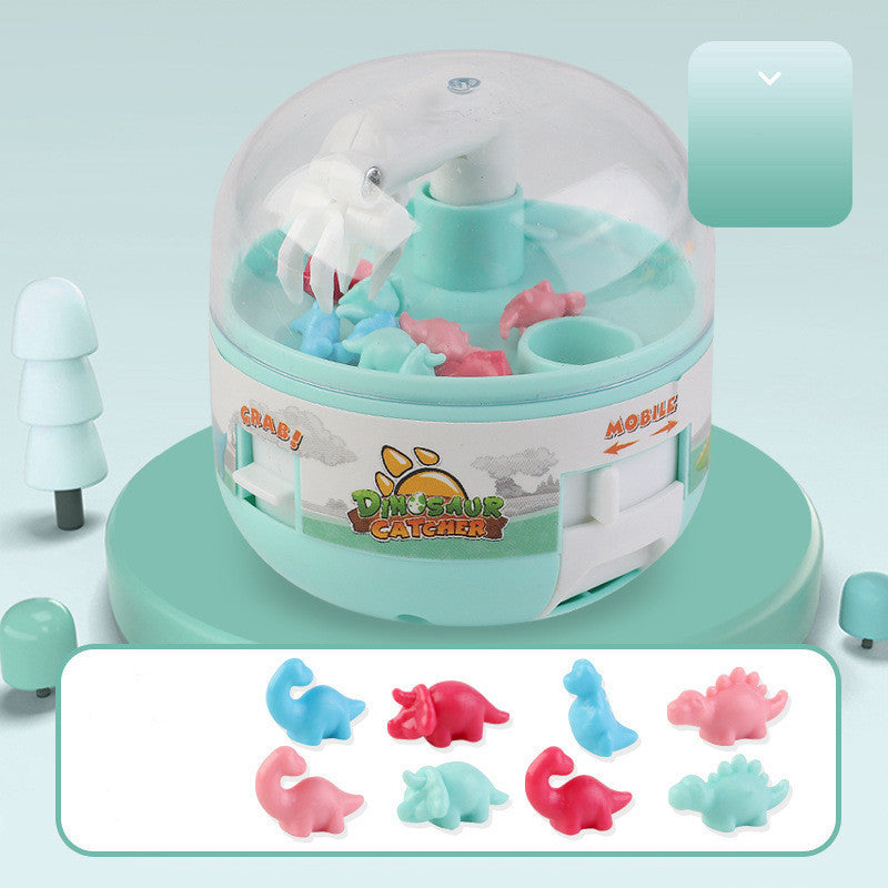 Children's mini dinosaur grabbing machine toy with plastic dinosaurs for kids' skill development.