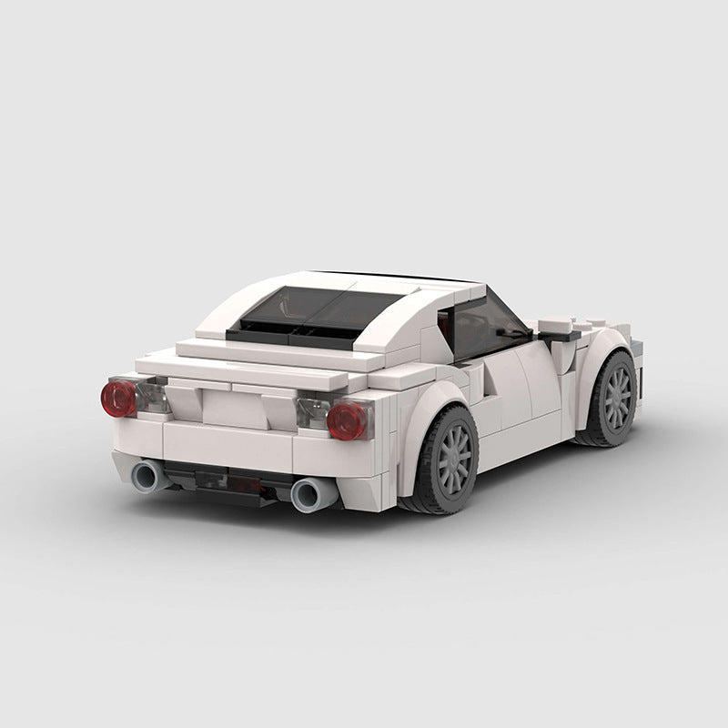 Small particle supercar racing toy made of ABS plastic for kids aged 7-14.