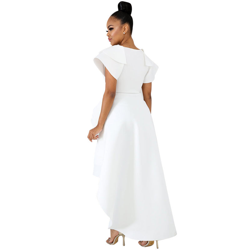 Elegant white high-waist evening dress with irregular skirt design.