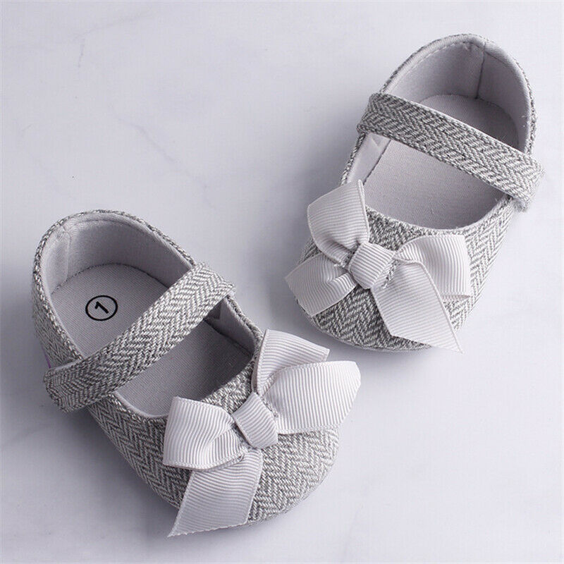 Toddler crib shoes with bows for baby boys, summer design.