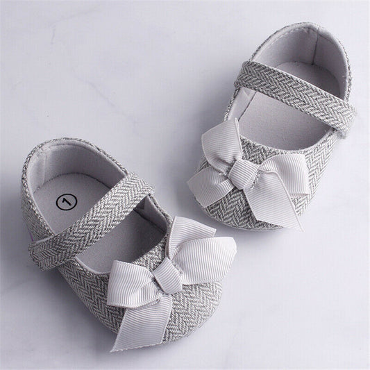 Toddler crib shoes with bows for baby boys, summer design.