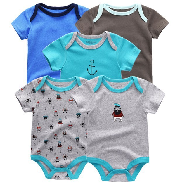 Set of colorful summer baby jumpsuits in natural cotton, featuring short sleeves and nautical designs.
