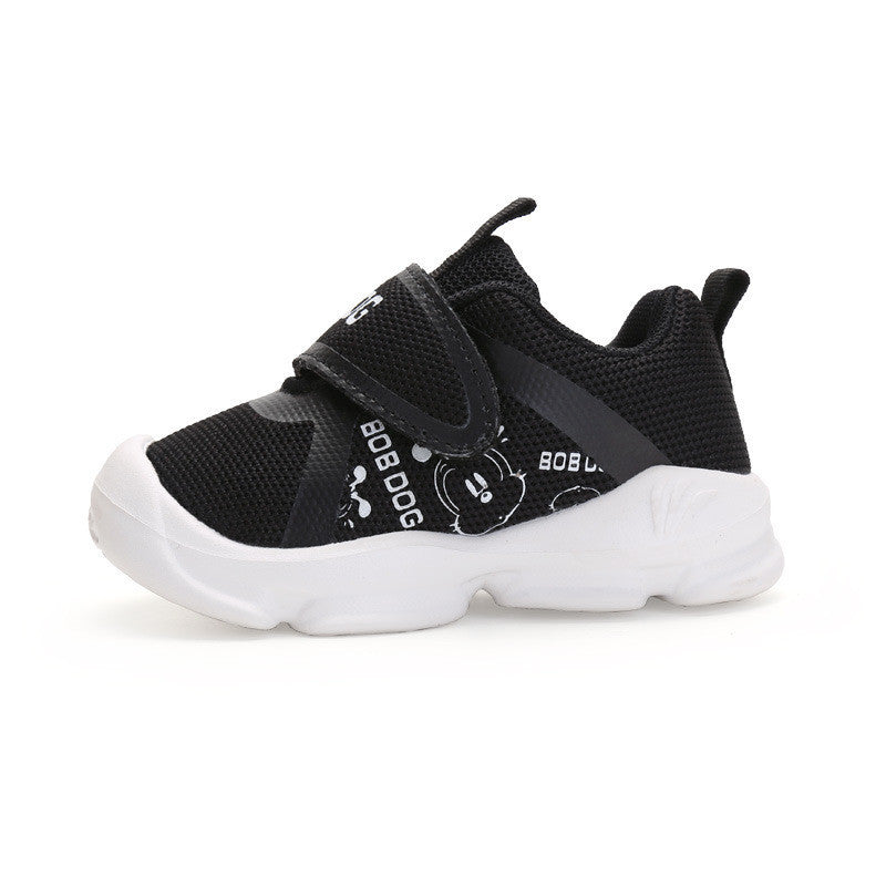 Black toddler sneakers with mesh upper, cowhide features, and Velcro closure.