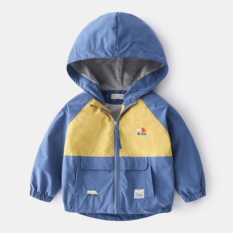Trendy hooded kid's jacket with cartoon pattern, blue and yellow design.
