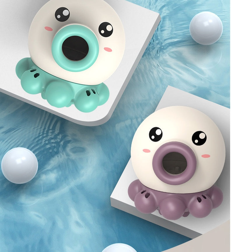 Octopus fountain bath toy with rotating water jets for kids, featuring a cute design in green and purple.