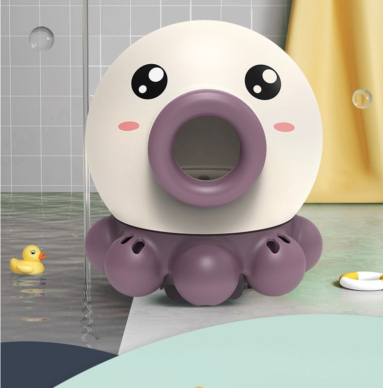 Octopus fountain bath toy with water jet and rotating features in a bathroom setting.