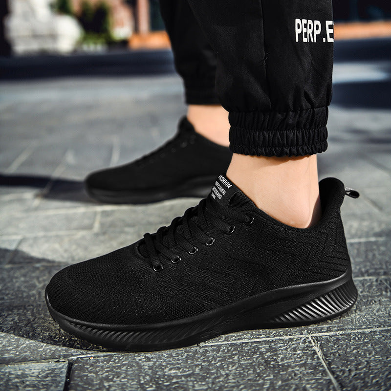 Ultralight black woven casual running shoes with breathable mesh design.