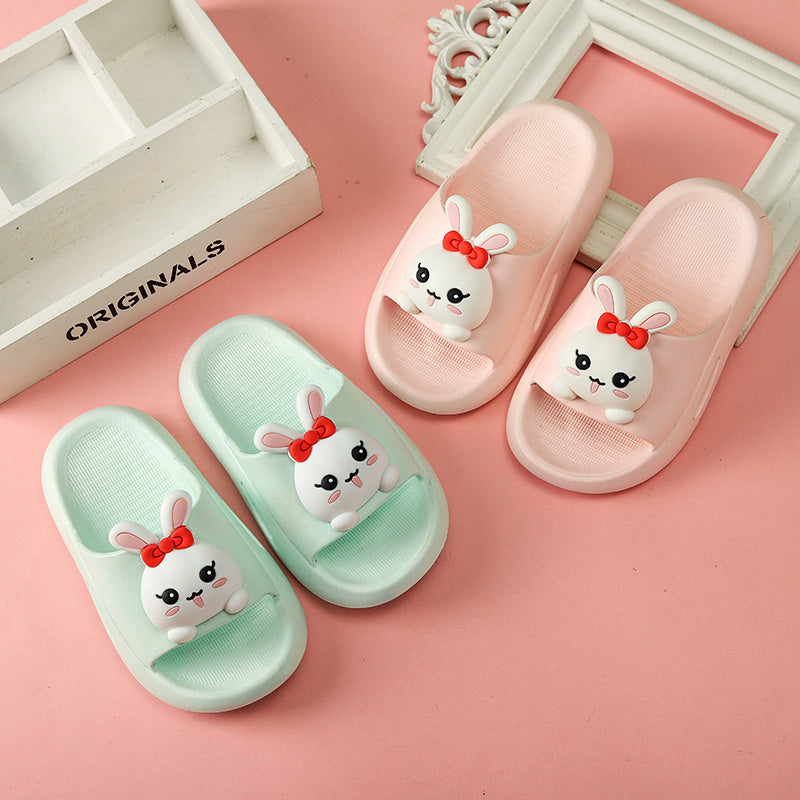 Kid cartoon cute sandals for boys with bunny design in pastel pink and green, flat heel, PVC sole.