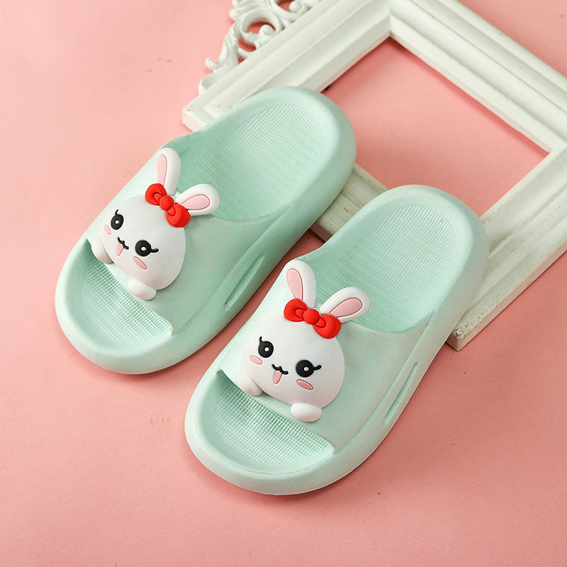 Kid cartoon cute sandals with bunny design in light green.