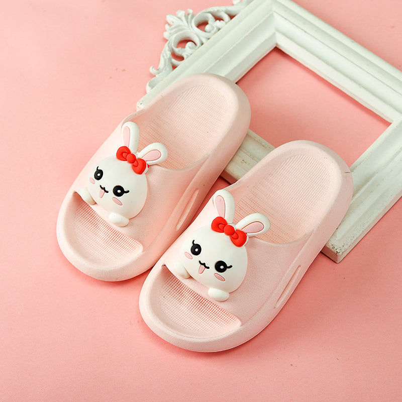 Kids pink sandals with cute bunny design, flat PVC sole, suitable for boys.