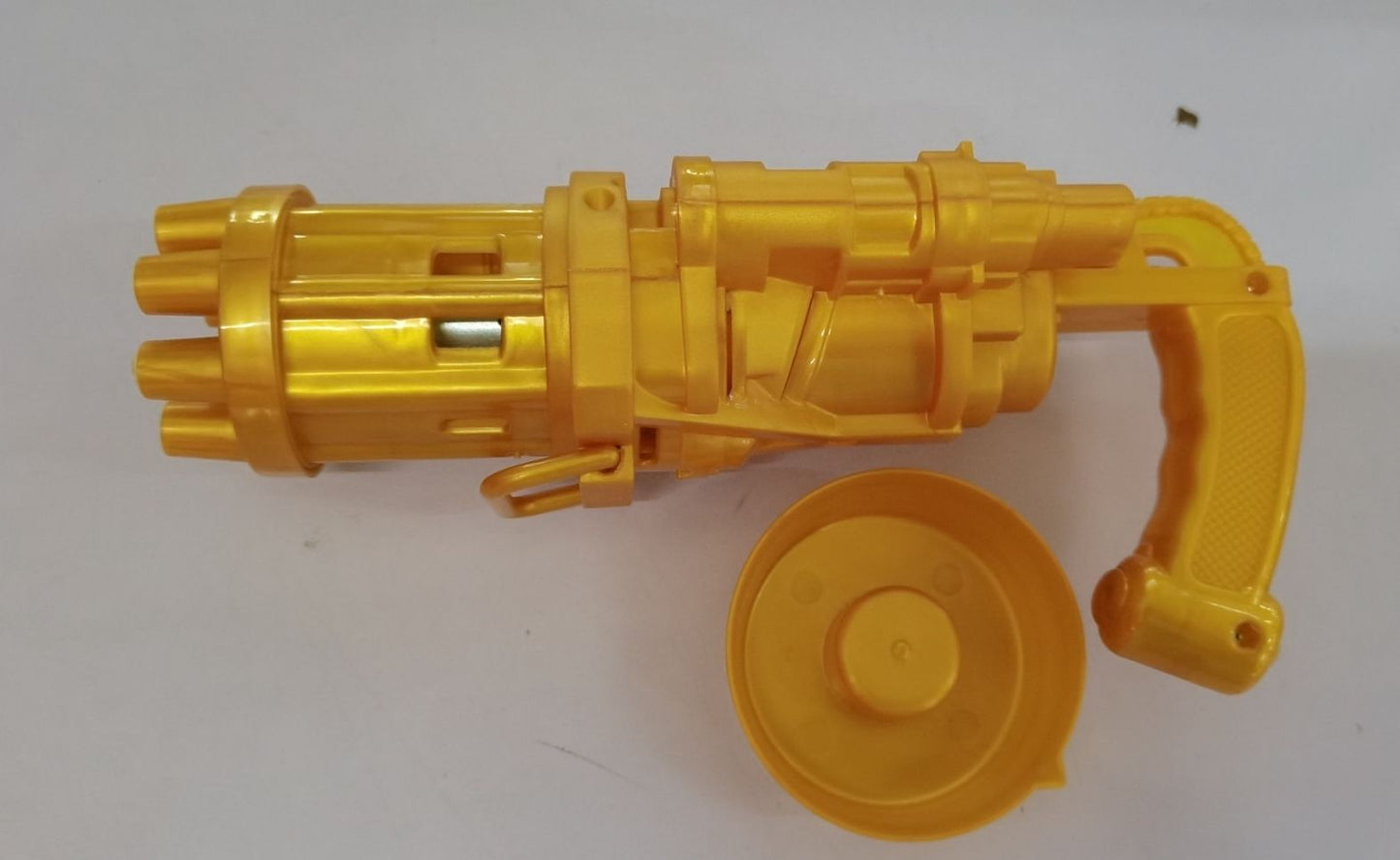 Kids plastic machine gun bubble toy in yellow with detachable part for easy cleaning.