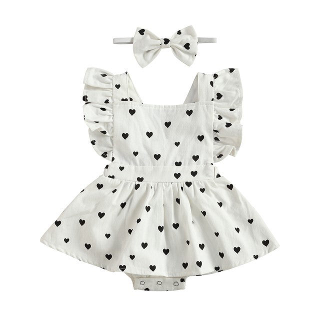 Cute girls' dress with bow, ruffled sleeves, heart print, in white. Suitable for infants to teens.