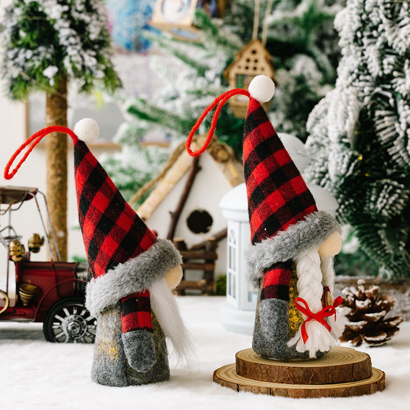 Christmas faceless dolls with red and black plaid hats, holiday decoration ornaments.