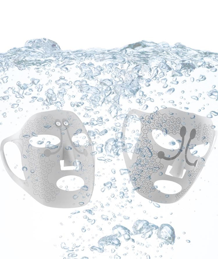 Electric facial massage mask submerged in water, showcasing skincare benefits.