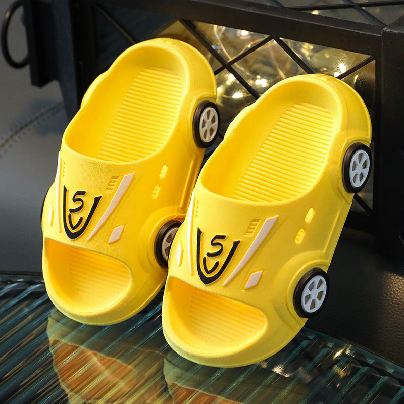 Yellow cartoon car-themed kids' slippers made of PVC with non-bright color options.