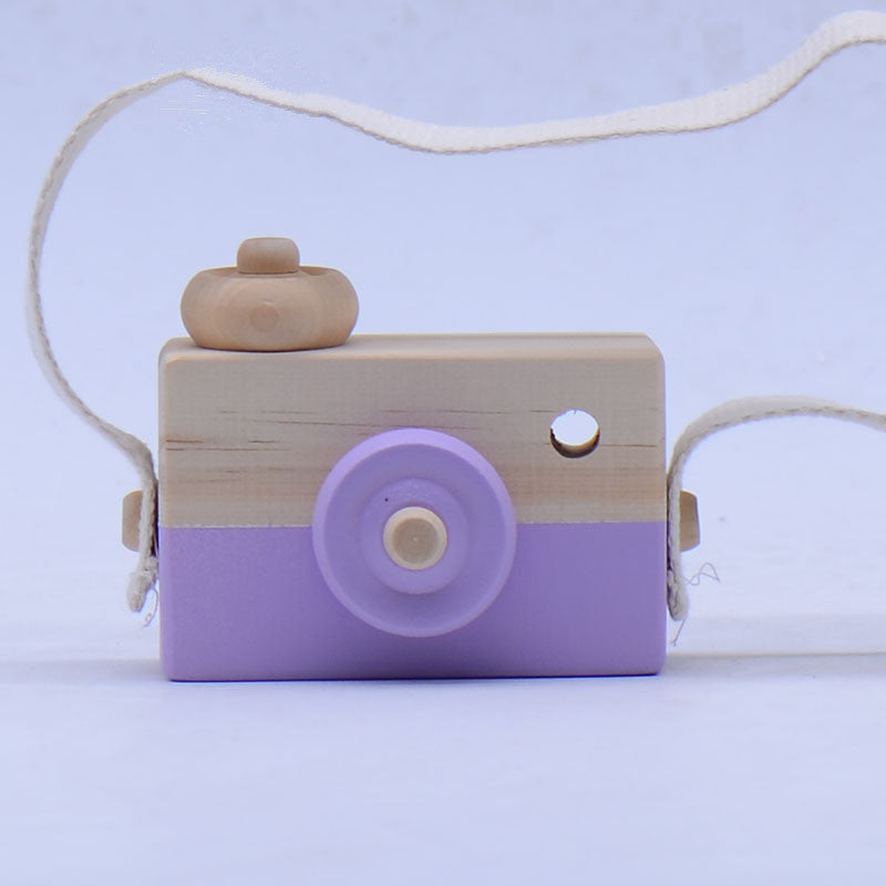 Cute wooden camera toy for kids, made from high-quality wood, suitable for ages 3 and up.