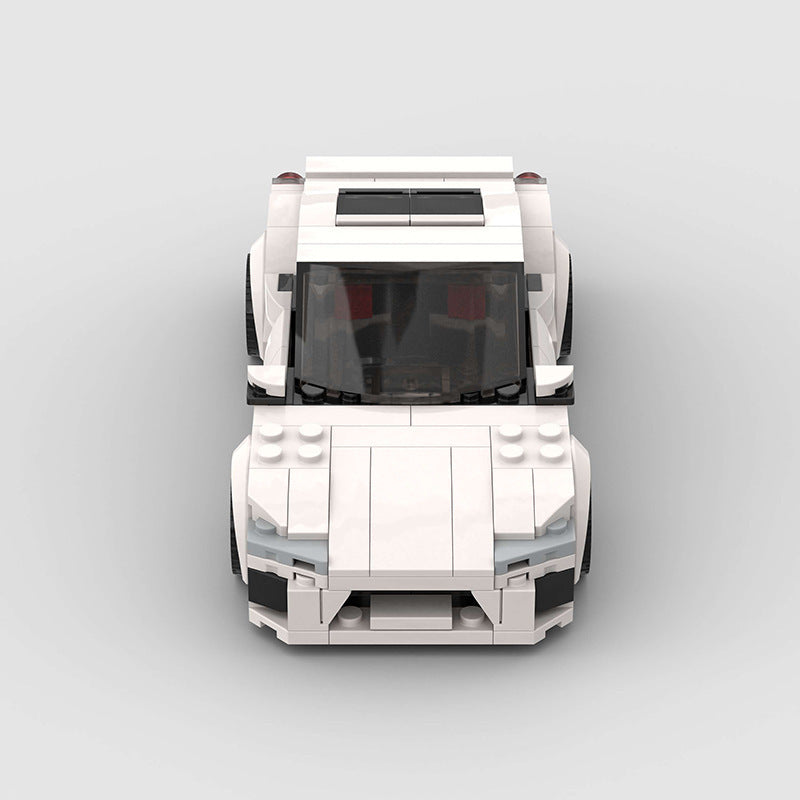 White small particle supercar racing toy for teenagers, compatible with ABS plastic building blocks.