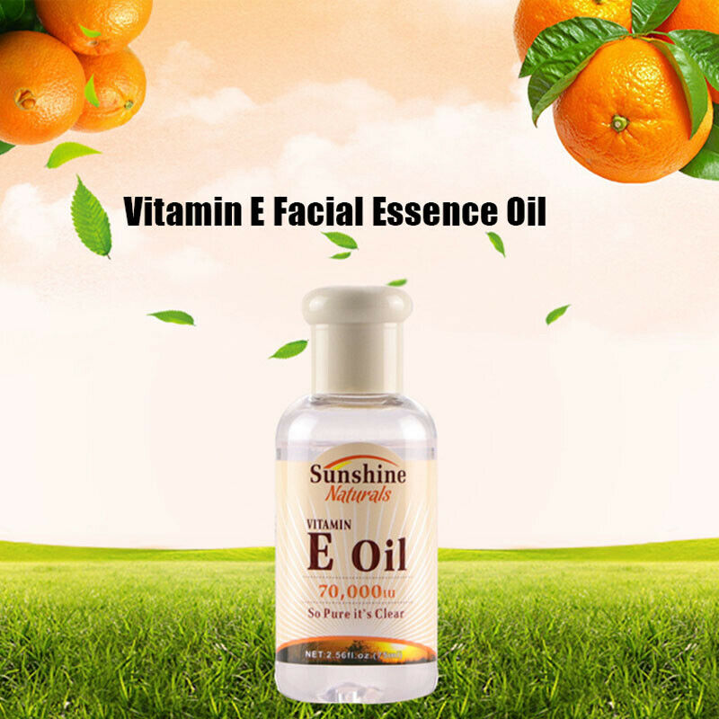 Vitamin E Plant Natural Oil bottle with moisturizing and firming benefits, surrounded by oranges.