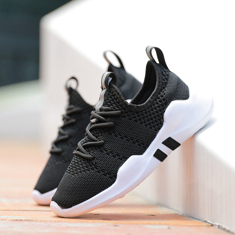 Kids' black lightweight sports shoes with breathable fly knit mesh design and MD sole.