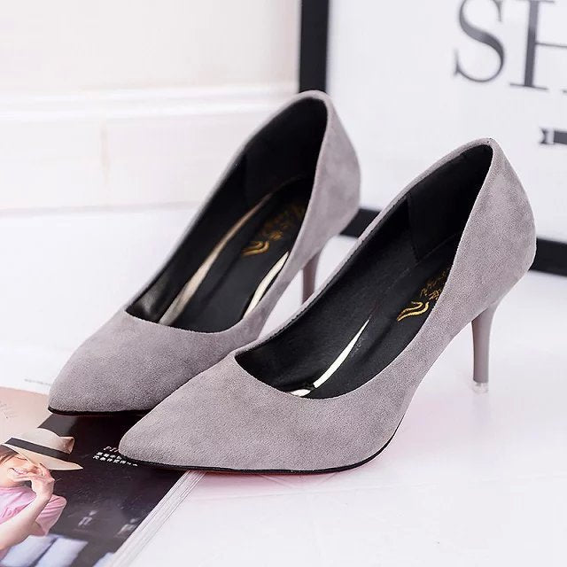 Pure color casual lady high heels with shallow mouth.