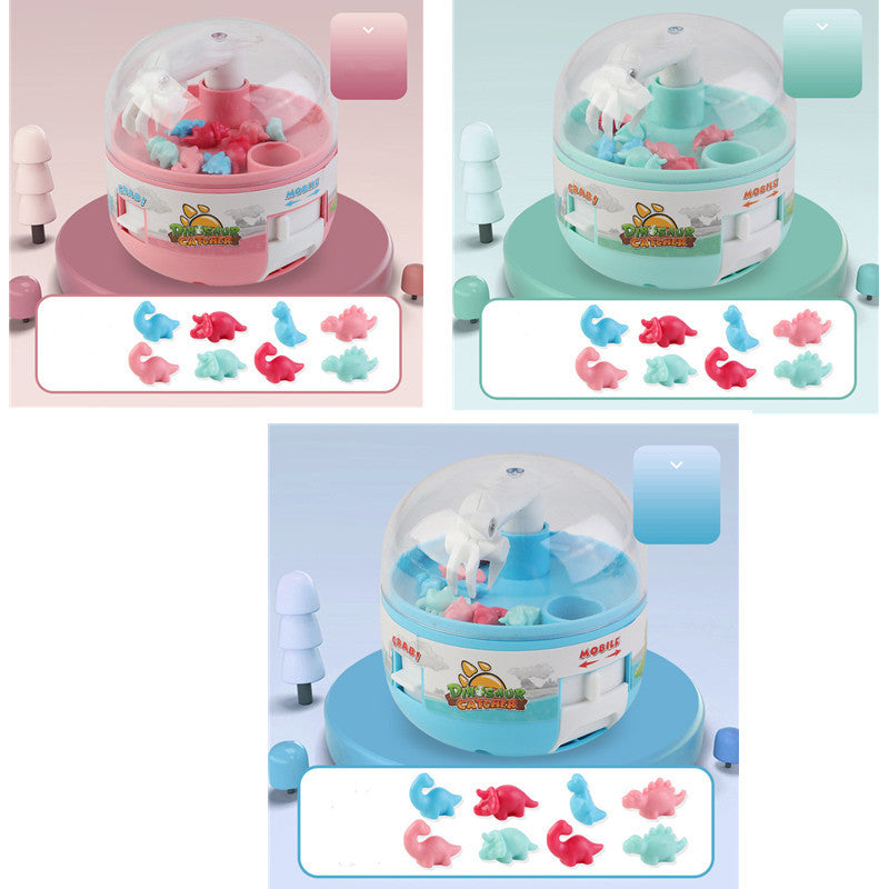 Children's gashapon toy mini dinosaur grabbing machine in three colors: red, blue, and pink.
