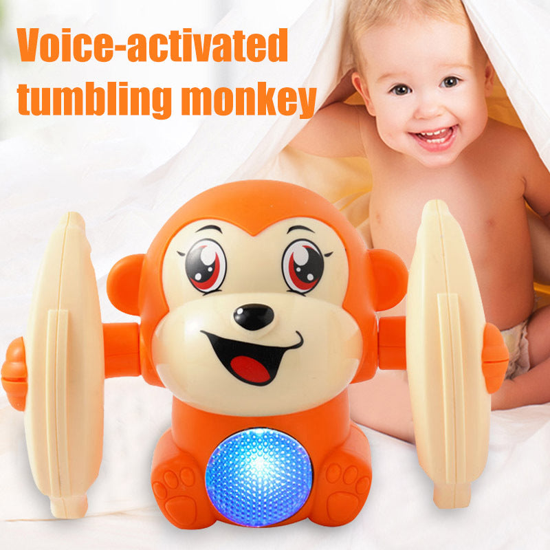 Light-up tumbling monkey toy for kids with educational features, voice-activated orange design.