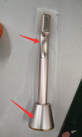 Therapeutic face massage tool with aluminum alloy body and dual head design.