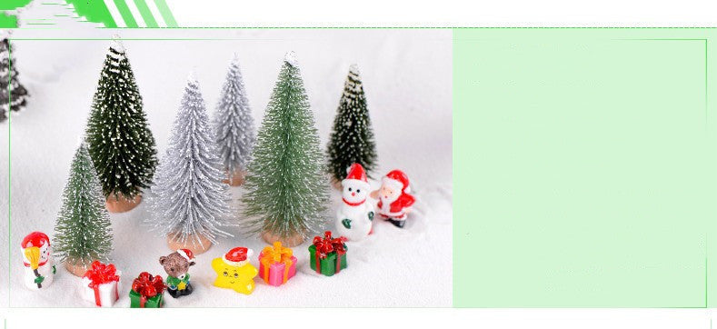 Festive miniature Christmas trees with snow and ornaments, multiple sizes available.