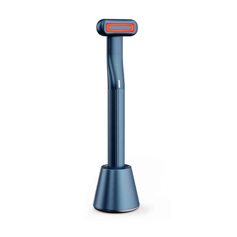 360-degree rotary eye massage tool with red LED light, dark blue finish.