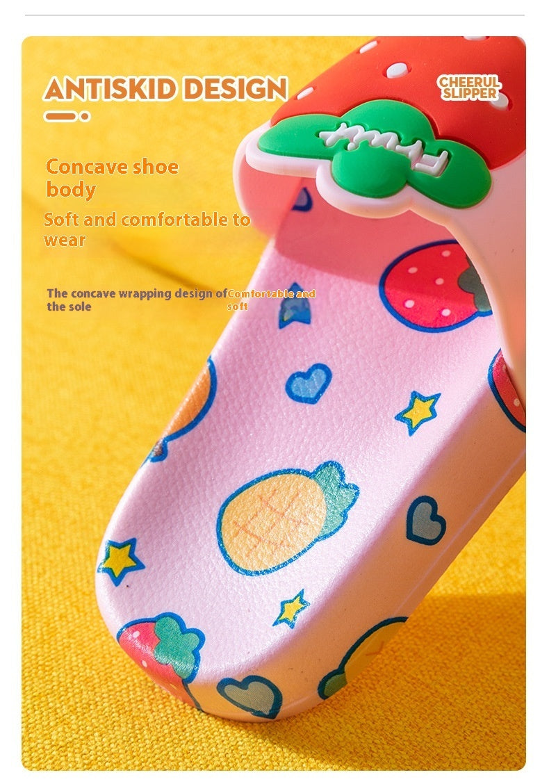 Cartoon pattern pink children's slippers with fruit design and non-slip PVC sole.