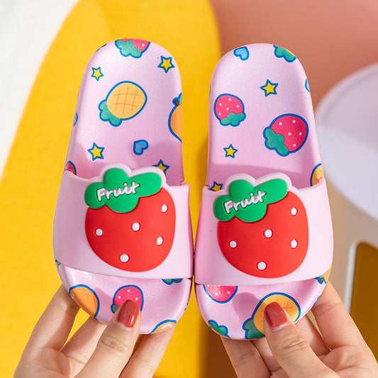 Pink strawberry-themed children's slippers with soft PVC material and non-slip soles.