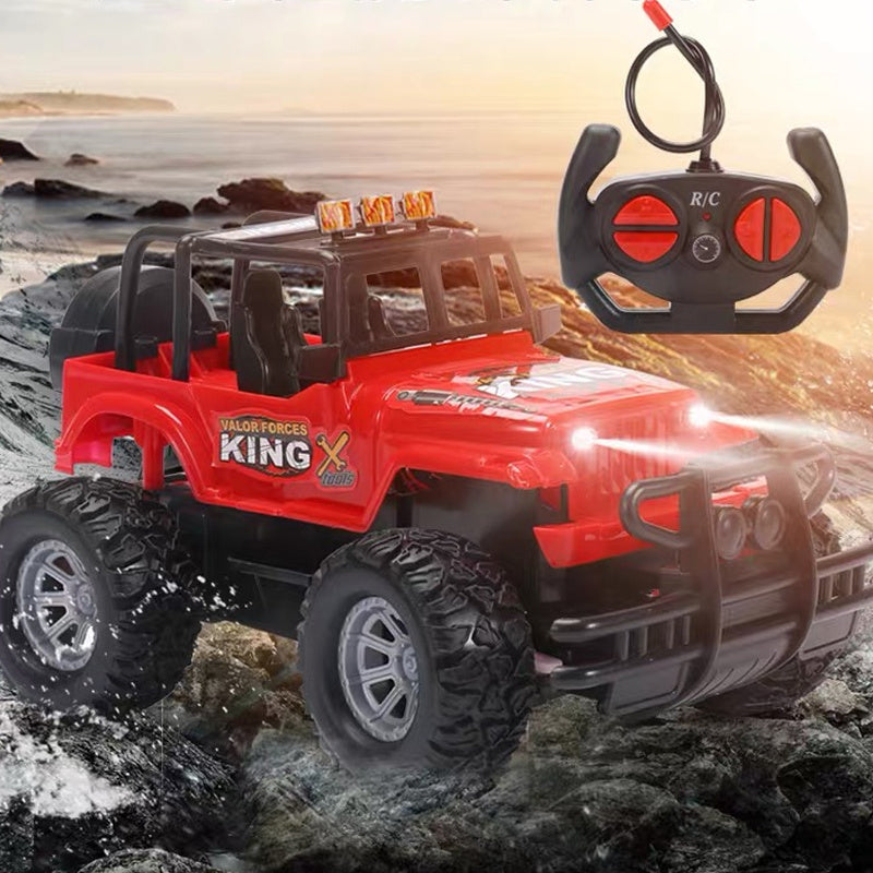 Red remote control toy car with USB charging and handle controller, ideal for boys aged 12 months to 12 years.