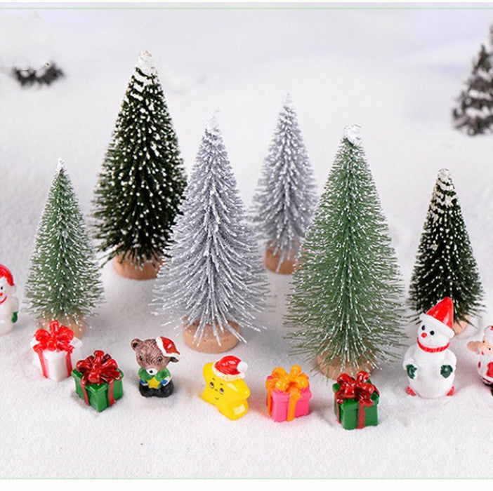 Mini festive Christmas trees with decorative ornaments and gifts, available in various sizes.