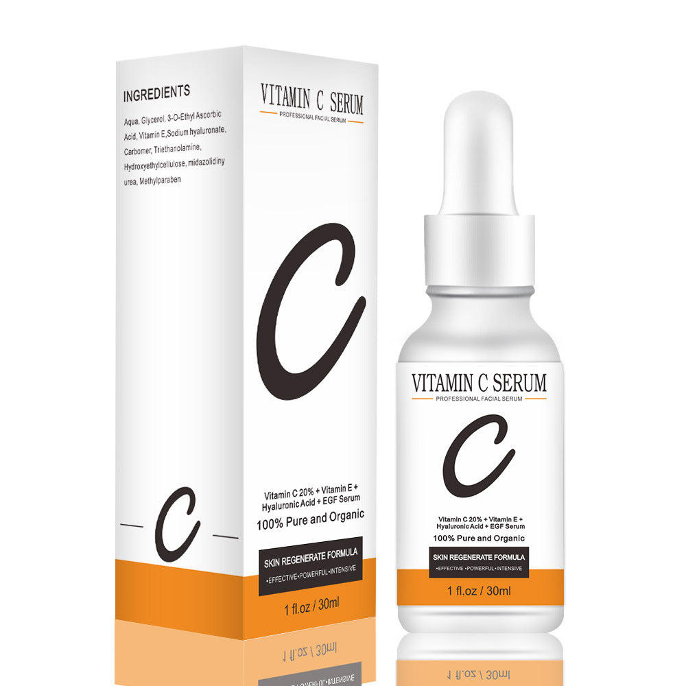 Organic whitening and anti-aging face serum with Vitamin C, hyaluronic acid, 30ml bottle.