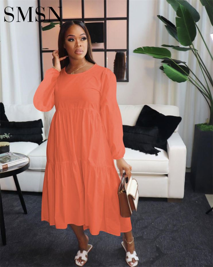 Plus size long sleeve solid color casual dress for women.