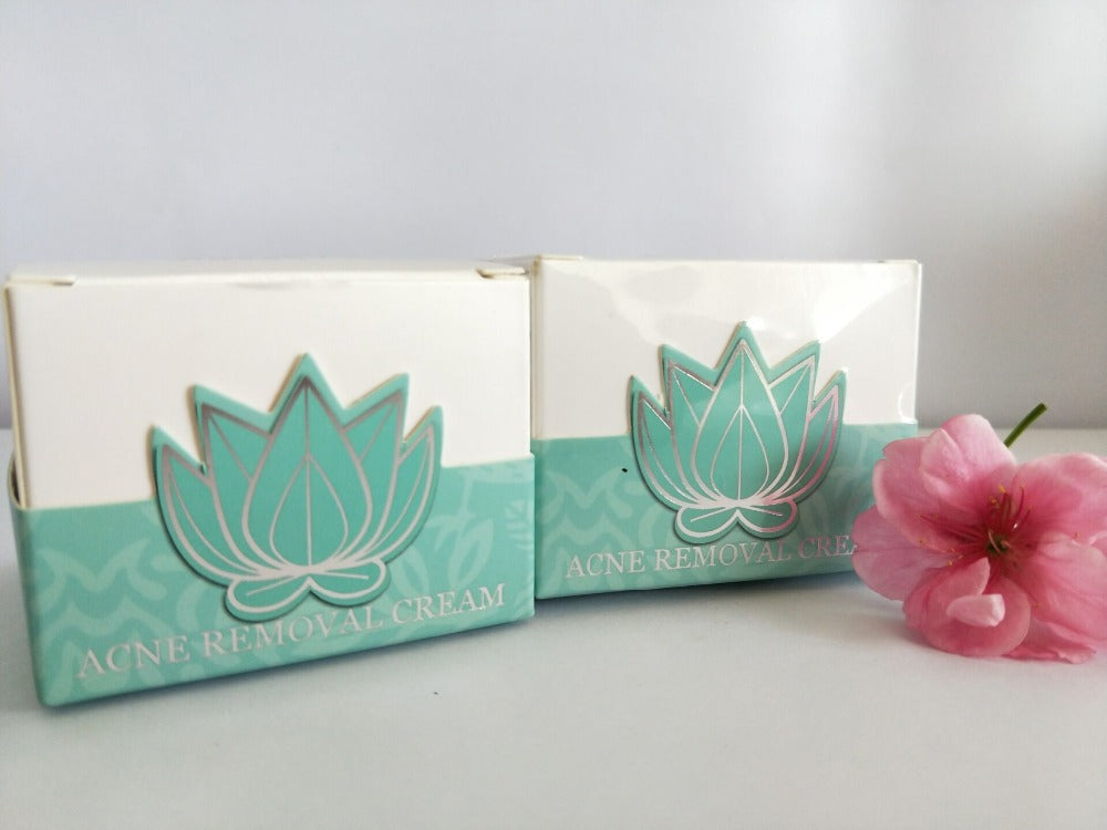 Excel Acne Treatment Anti Acne Serum, 50g, with acne removal cream packaging and pink flower decoration.