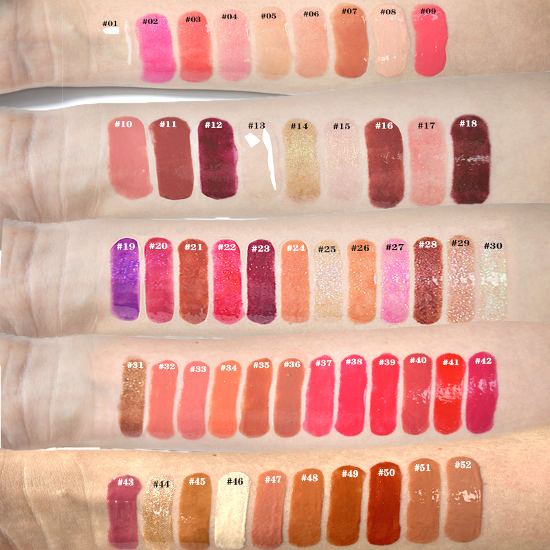 Lip gloss color swatches on skin showcasing a range from pinks and nudes to bold reds and purples.