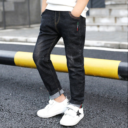 Kids Stretch Denim Pants in black shown from the front and back