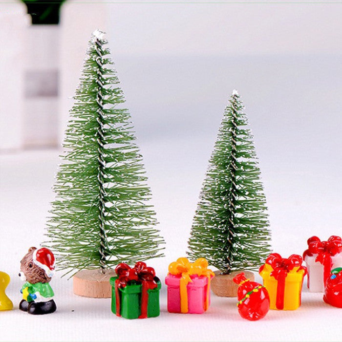 Festive mini Christmas trees with meaty ornaments and gifts, available in various sizes.