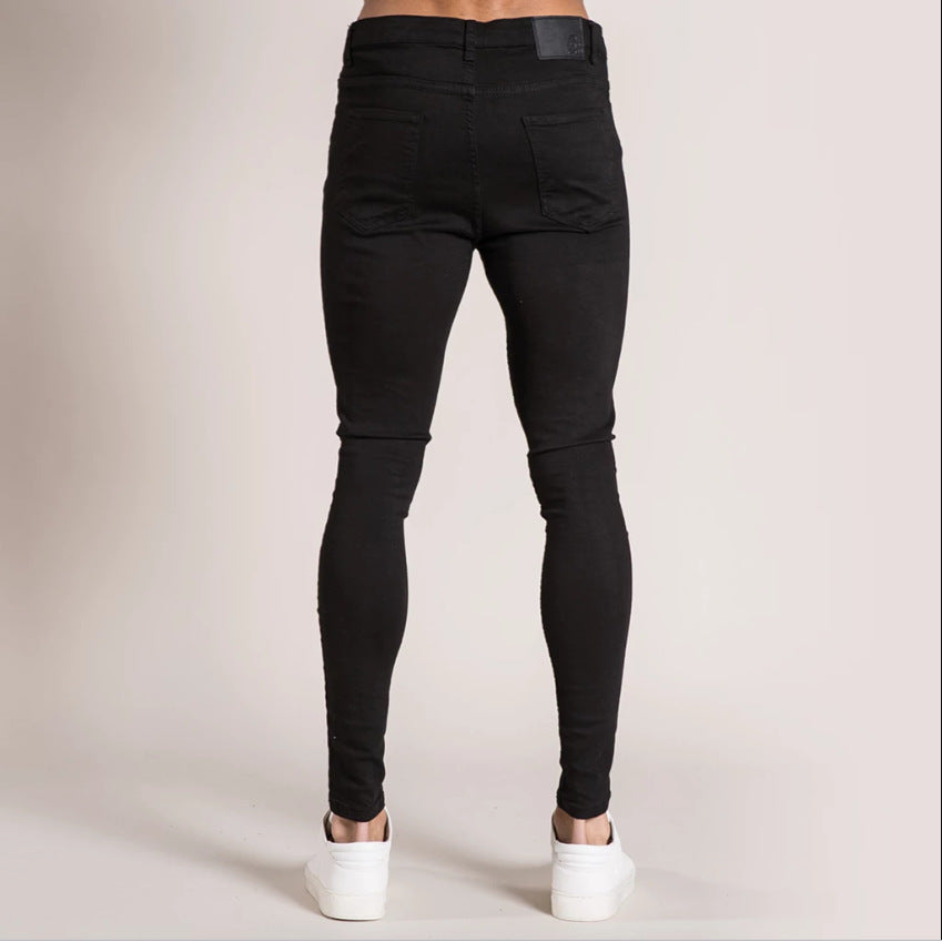 Mens Slim Fit Jeans in black denim shown from the back with pockets