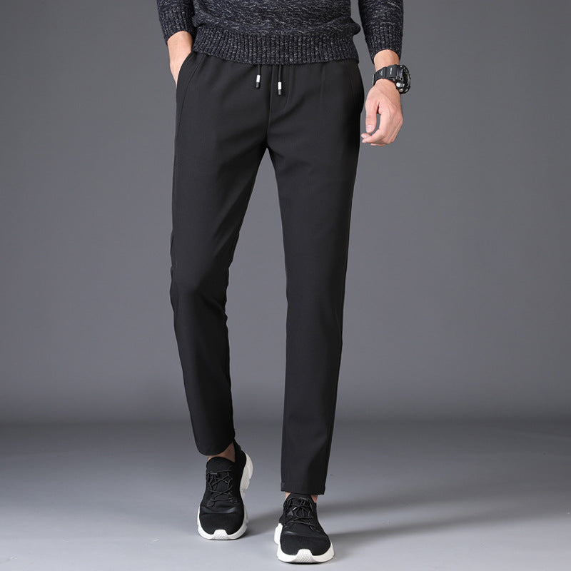 Mens Slim Fit Trousers in black with a drawstring waist and straight-leg fit