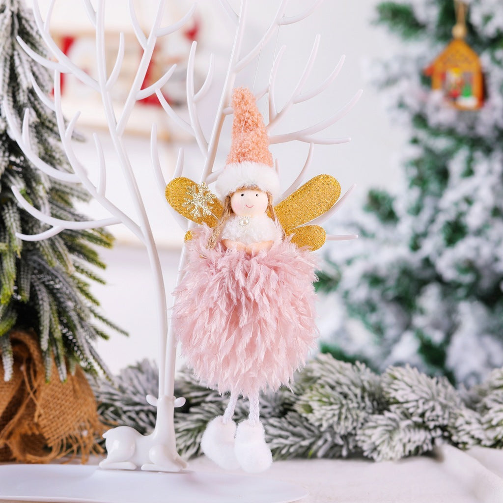 Pink angel pendant with snowflake, creative Christmas window decoration.