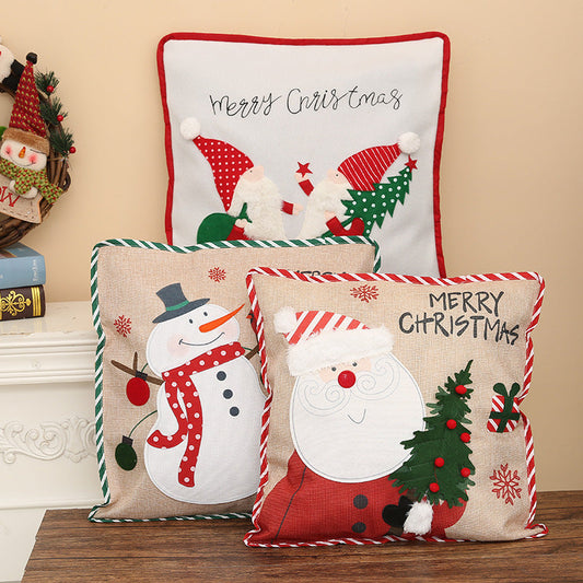 Decorative Santa Claus and Snowman linen pillowcases, 46x46 cm, with Christmas design.