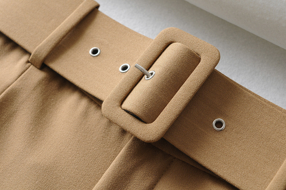 Belted High-Waist Trousers in khaki with a fabric-covered rectangular buckle, metal eyelets and front pleats