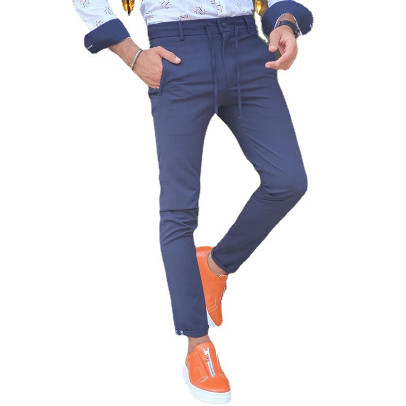 Casual Pants StraighMens Straight Casual Trousers in navy blue, model wearing a patterned shirt and orange trainers against a white backgroundt Trousers