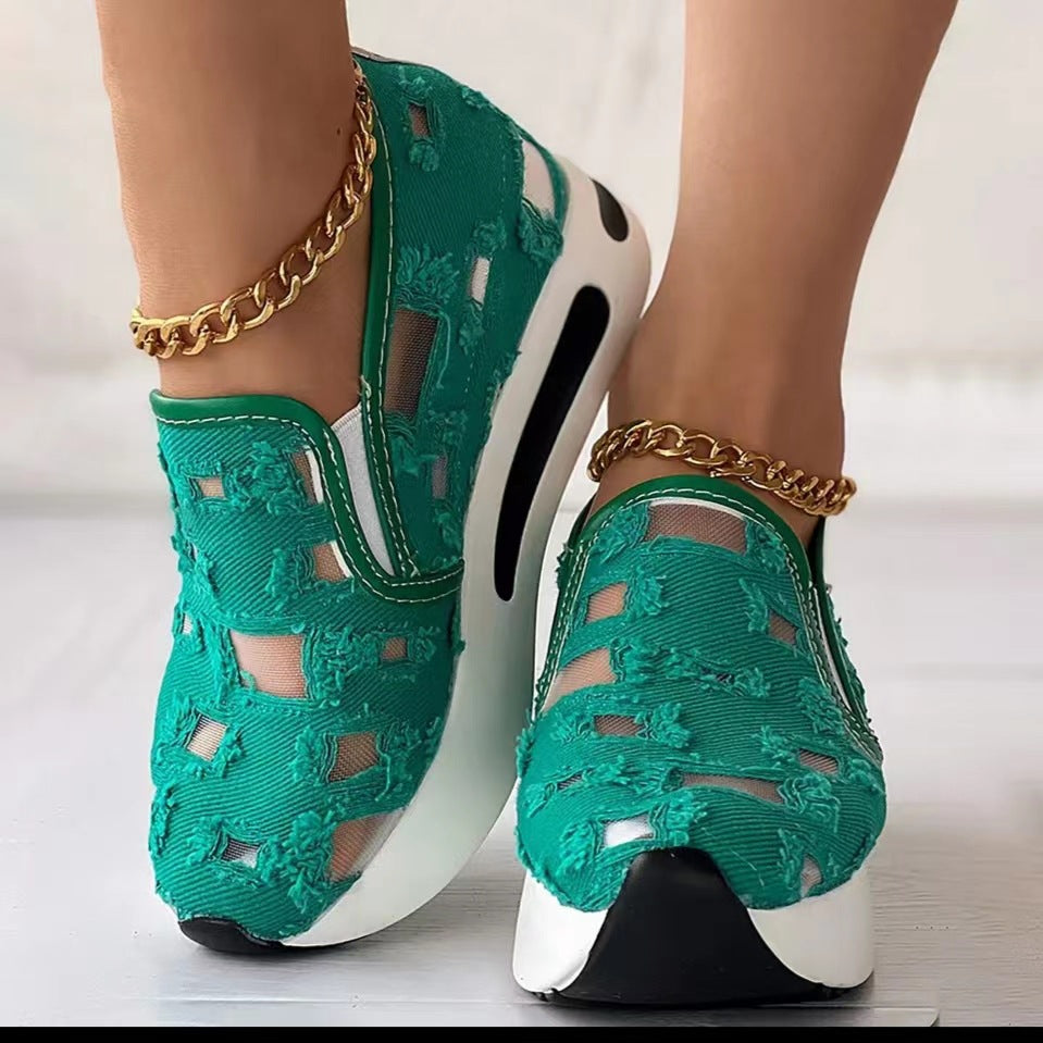 Hollow Out Canvas Shoes in green with distressed cut-out uppers and contrasting white soles with black detailing, shown worn.