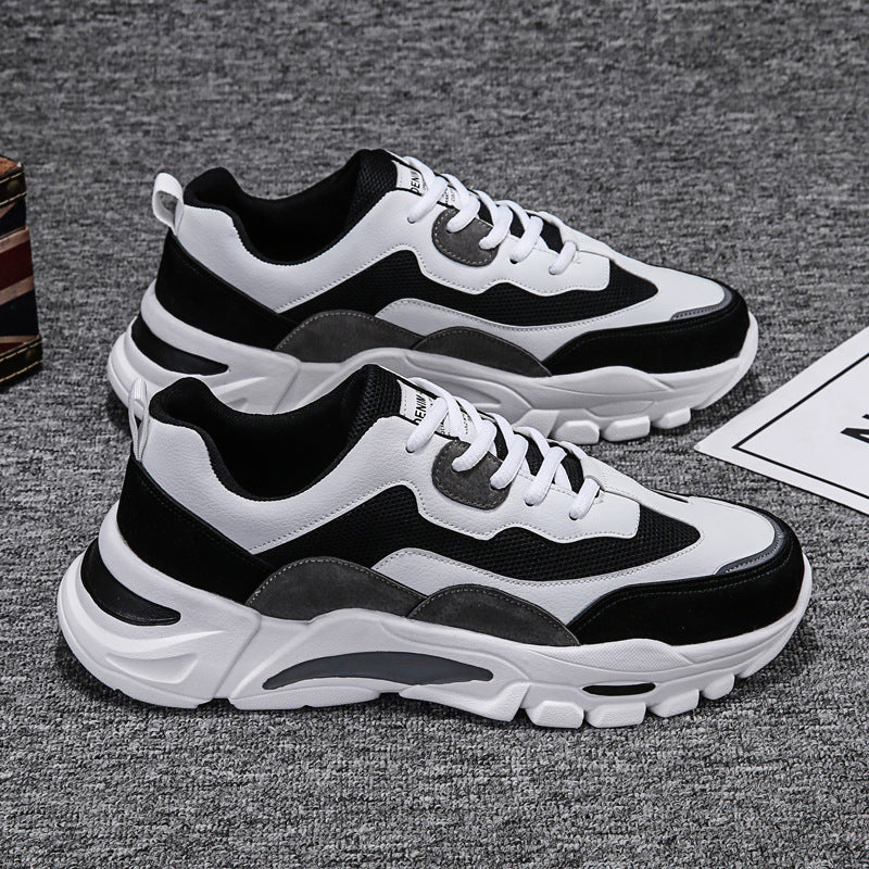 Mens Chunky Platform Sneakers in the White colourway, displayed as a pair with black and grey panels and sculpted white soles.
