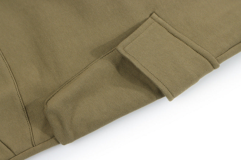 Mens Hip Hop Cotton Trousers in Black, close-up of the light-coloured drawstring ends against the fabric