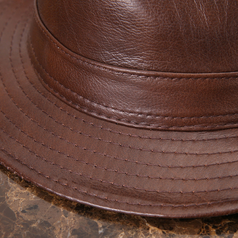Mens Leather Fedora Hat in Brown, close-up showing the textured surface, matching hatband and multiple rows of brim stitching