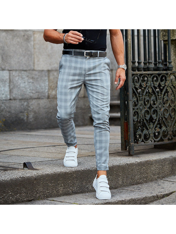 Mens Loose Fit Plaid Trousers in Grey Blue on a model, front view showing the checked fabric and tapered silhouette